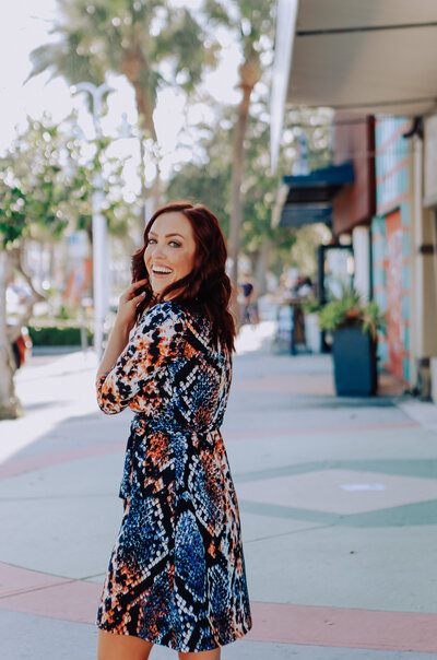 girl turning away from camera while smiling