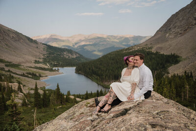 Couple with tattoos enjoying their outdoor elopement at Blue Lakes in Breckenridge, Colorado