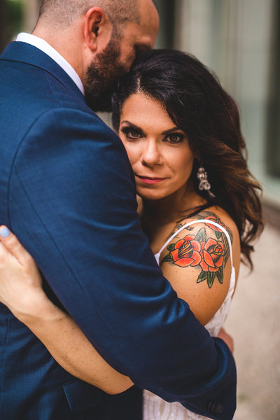 Bride hugging her groom on wedding day in Tampa, Florida