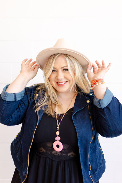 amanda in pink hat and denim jacket