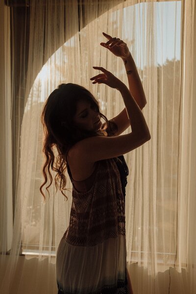 Luna Skye dancing in shadow