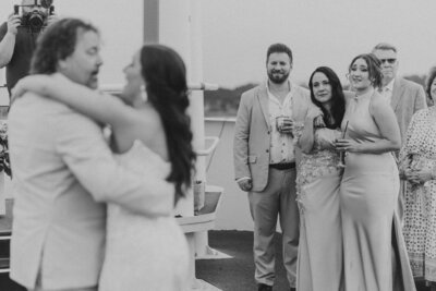 newlyweds touching hands