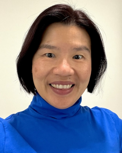 Rachel smiles for a portrait