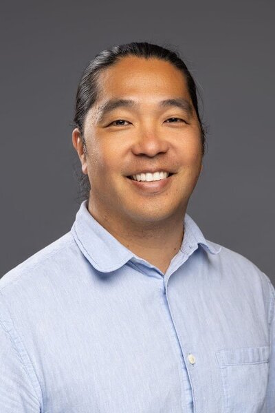 Headshot of vice president, Matthew Echohawk-Hayashi