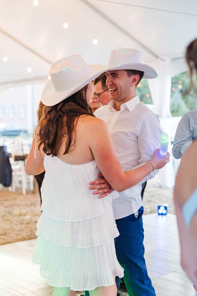 Kentucky couple popping champagne on their wedding day