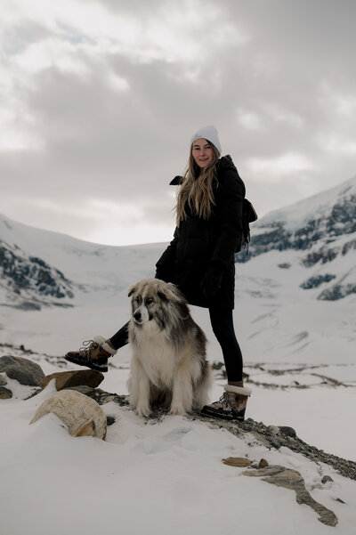 Jasper National Park Alberta Canada winter hiking on a glacier with a dog