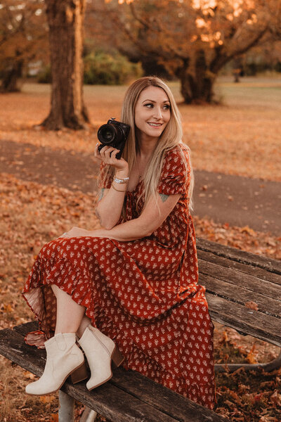 Portrait of Laura Vitale, photographer, outdoors in Doylestown, Pennsylvania