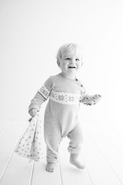 Little boy walking in the studio