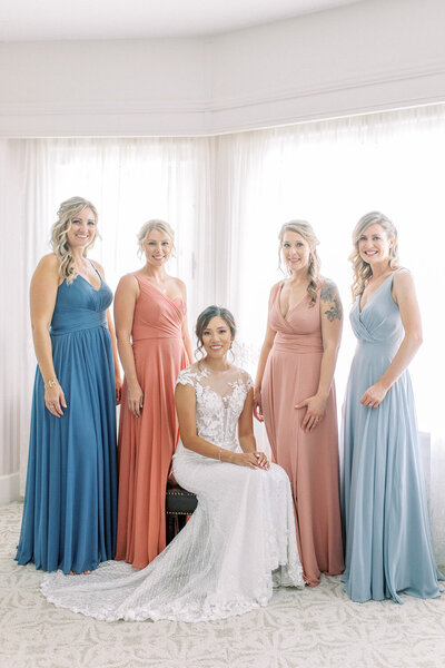 A groups photograph of the brides maids and the bride at a Calgary wedding