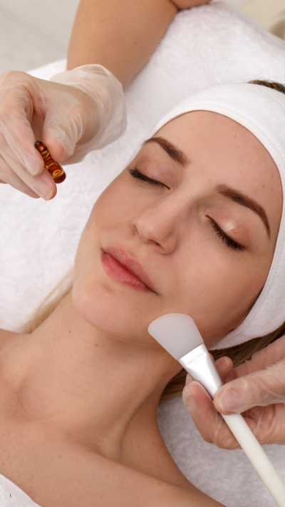 woman receiving a PCA chemical peel in a specialty facial.
