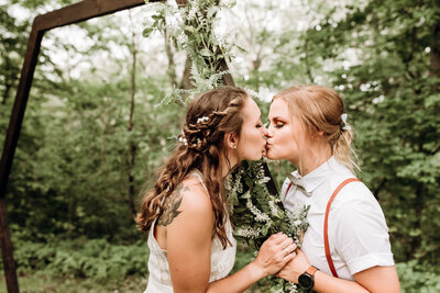 Kissing brides taken at Weston State Park in Weston, Missouri.