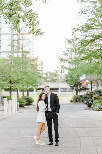 Engaged couple stops for a photo in downtown Little Rock Arkansas.