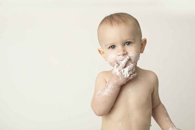 Birthday boy eating cake