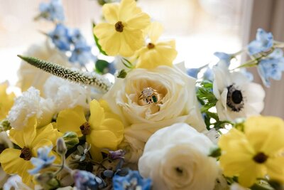Wedding Rings in bouquet detail shot from an Indianapolis Wedding Video.