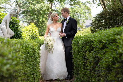 Married couple in a garden portrait in Jackson, Mississippi.