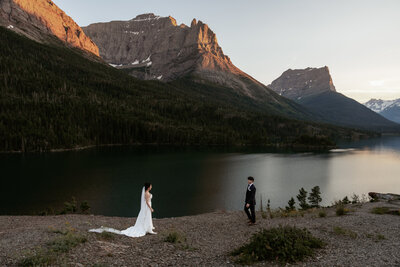 A couple poses during their engagement session in Glacier National Park.