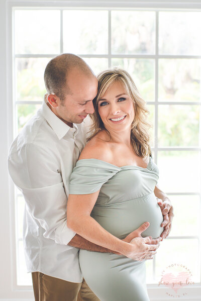 studio maternity pictures for pregnant couple