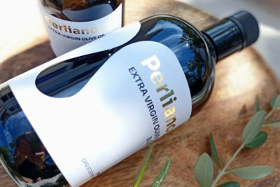 Olive oil from Croatia with custom die cut and gold foil created by brand designer Marta Custic from Studio Stoked