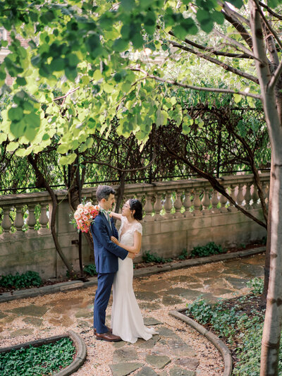 Bride and groom at Meridian House in Washington DC. Wedding floral design by The Garden Studio LLC.
