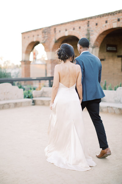 Bride and groom walking taken by the Best McCall Wedding Photographers