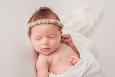 sleeping baby at her Carlsbad newborn photography session