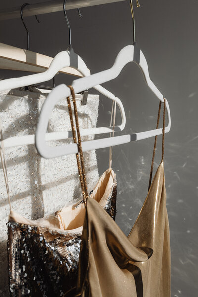 kaboompics_party-essentials-detail-of-glittering-fabrics-for-new-years-eve-silver-sequins-and-gold-satin-33555