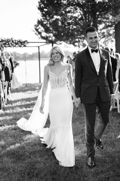 Bride and groom walk up memorial steps at their DC wedding