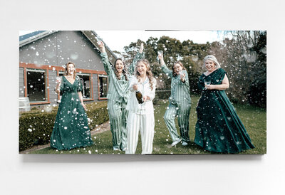 Wedding print box sample showcasing professionally printed photographs in a keepsake box, offered by Zanthe Vorsatz Photography.
