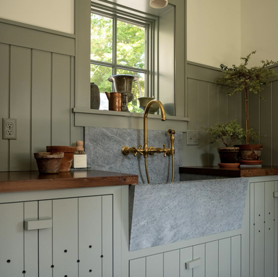 The best green paint colors, according to designers. Cabinetry by Amelia Cabinet Company | Nadine Stay