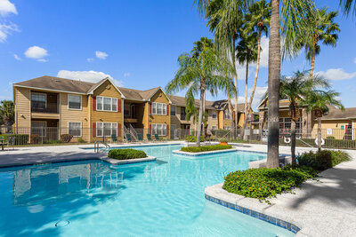 Swimming pool at Hearthstone Apartments in McAllen Texas highlighting the relaxing outdoor amenities available to residents through WLS Interests property management.