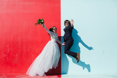 las vegas bride and groom jumping