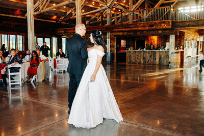 Bride and groom first dance at Snowline Acres in Kalispell, MT
