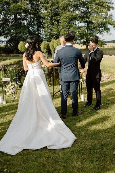 Luxury wedding in Europe – sophisticated bride in a modern wedding gown and groom in a timeless suit.