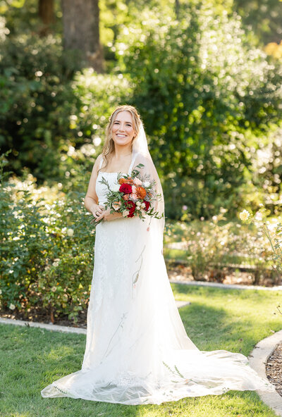bride and groom smiling at each other