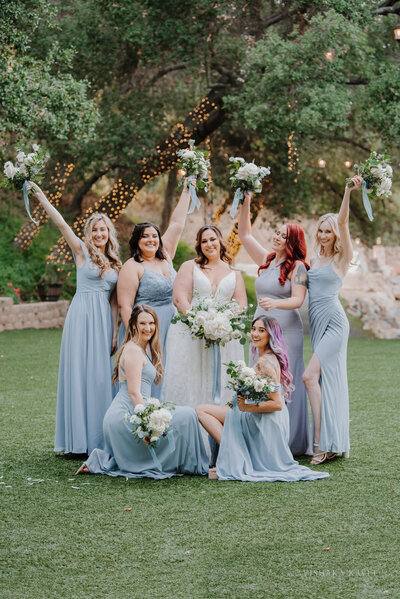 bride surrounded by bridal party
