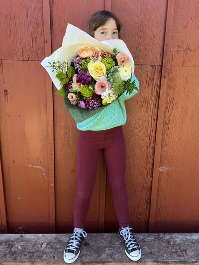 Flower wrapped in bouquet arrangement