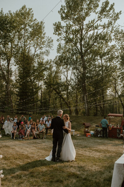 father daughter first dance at backyard wedding in Alberta