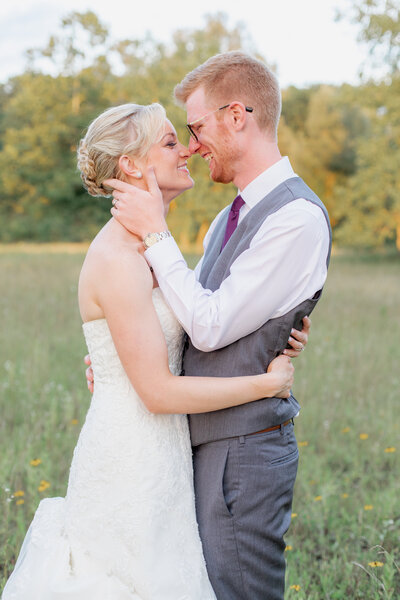Husband and wife in close embrace