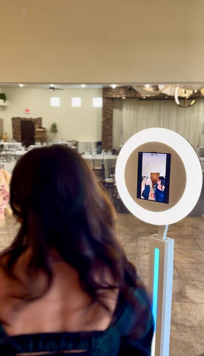 360 video booth with bride and groom