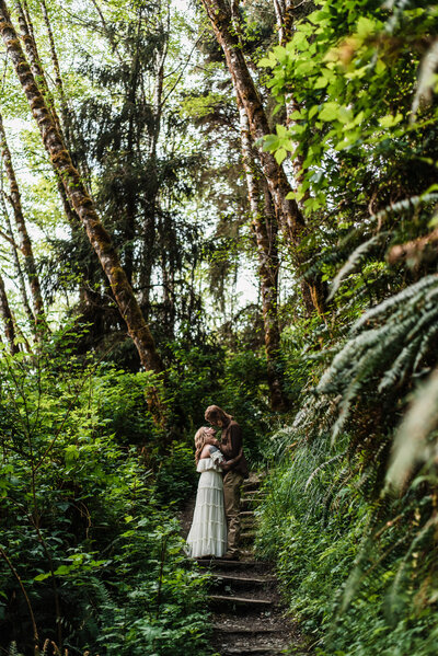 couple getting married in a forest