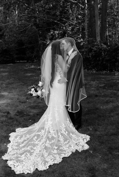 a couple embracing for their romantic engagement photos