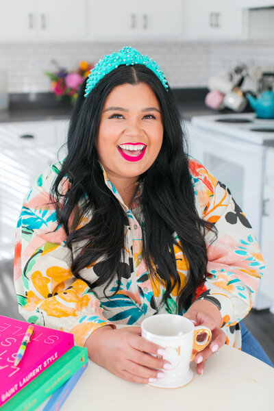 colorful woman holding mug