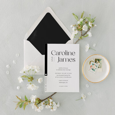A black and white modern semi custom wedding invitation suite, perfect for a Washington DC wedding styled for sleek city minimalism.