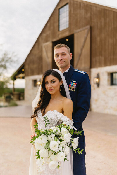 Bride and military groom at wedding planned by Bianca Nichole and Co