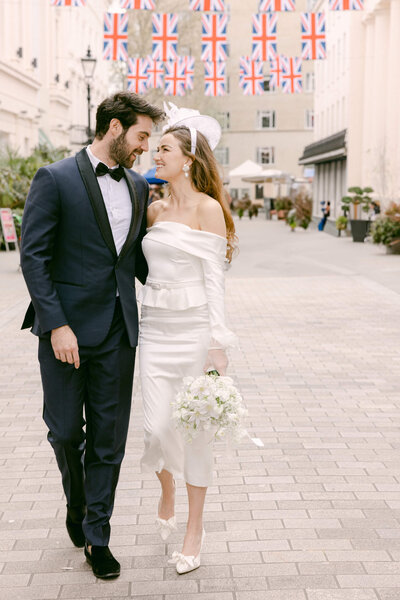 A wedding day photo of the couple in front of the Goring Hotel in London the United Kingdom