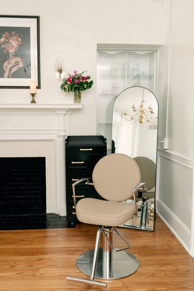 salon chair and mirror at Moxie Hair Studio
