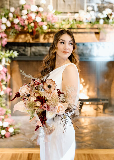 bride with white dress in outdoor garden coordinated by AK Events Co