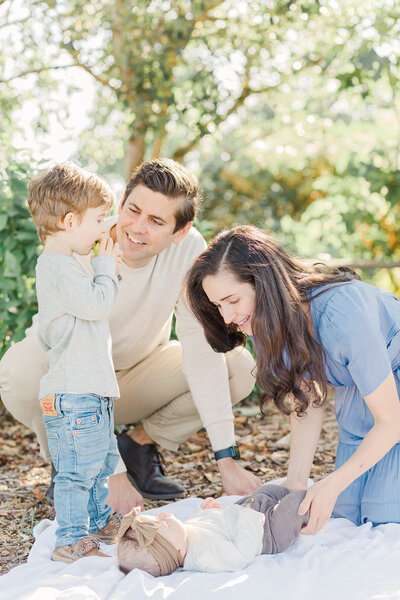 Family of four on a blanket for Portland, Oregon family pictures