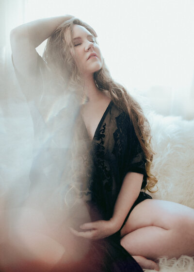 Luxury Photographer, and one of the Midwest's best in boudoir, weddings, portraits and family