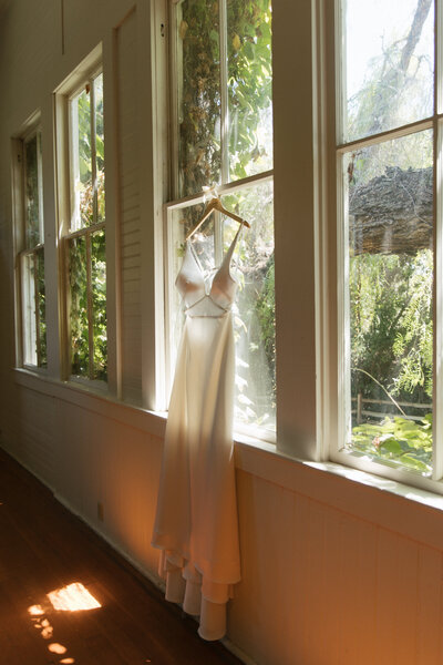 Satin simple hanging wedding dress